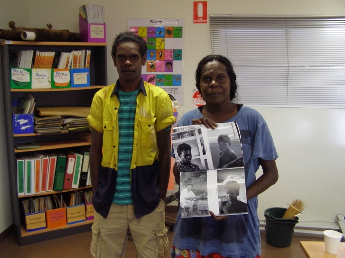 Kristie Nundhirribala and her son Jackson. They hold an album determined to see a photo of her father, Buguju Nundhiribaka 